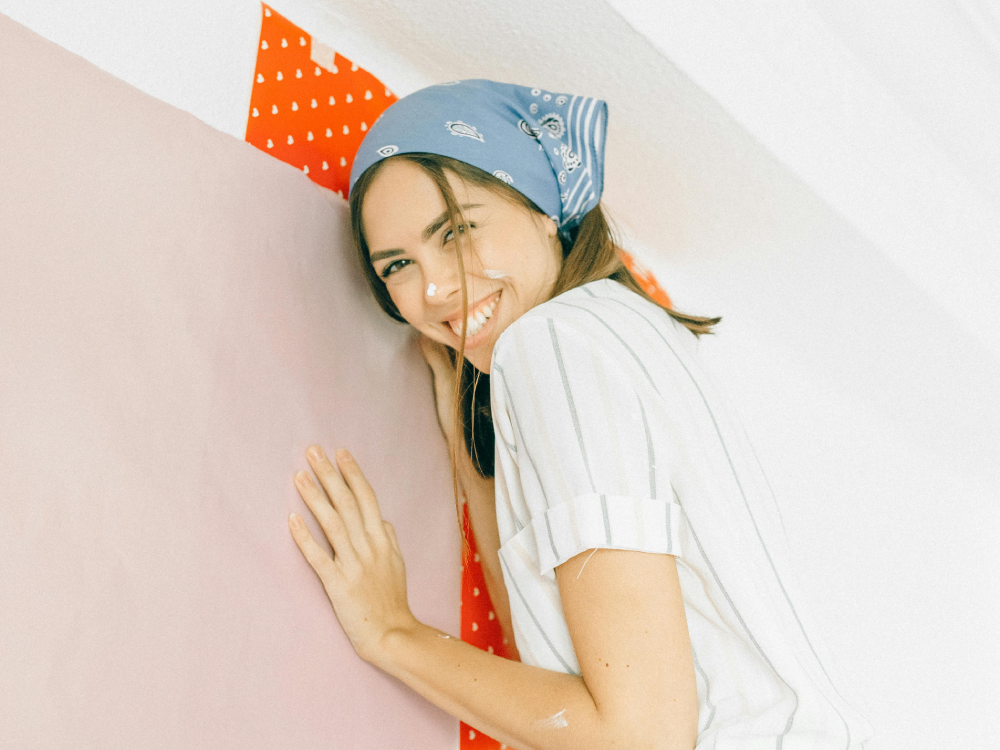 A Canadian woman renovating her home with wallpaper and paint, wondering if her credit score matters before she buys all the gear for her renos.